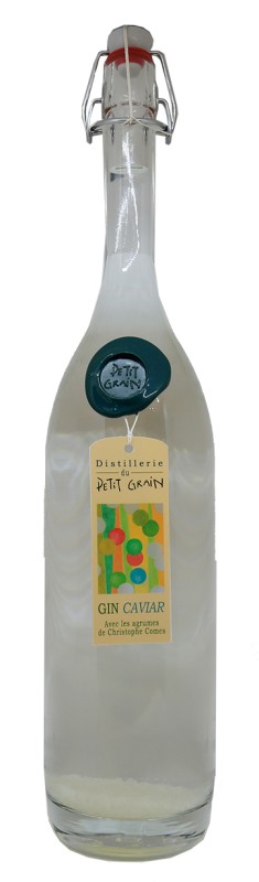 bouteille gin Caviar Magnum, Distillerie du Petit Grain, gin artisanal, gin aux agrumes, perles d’agrumes translucides, gin bio français, alambic cuivre, terroir Hérault, agrumes du chef Christophe Comes